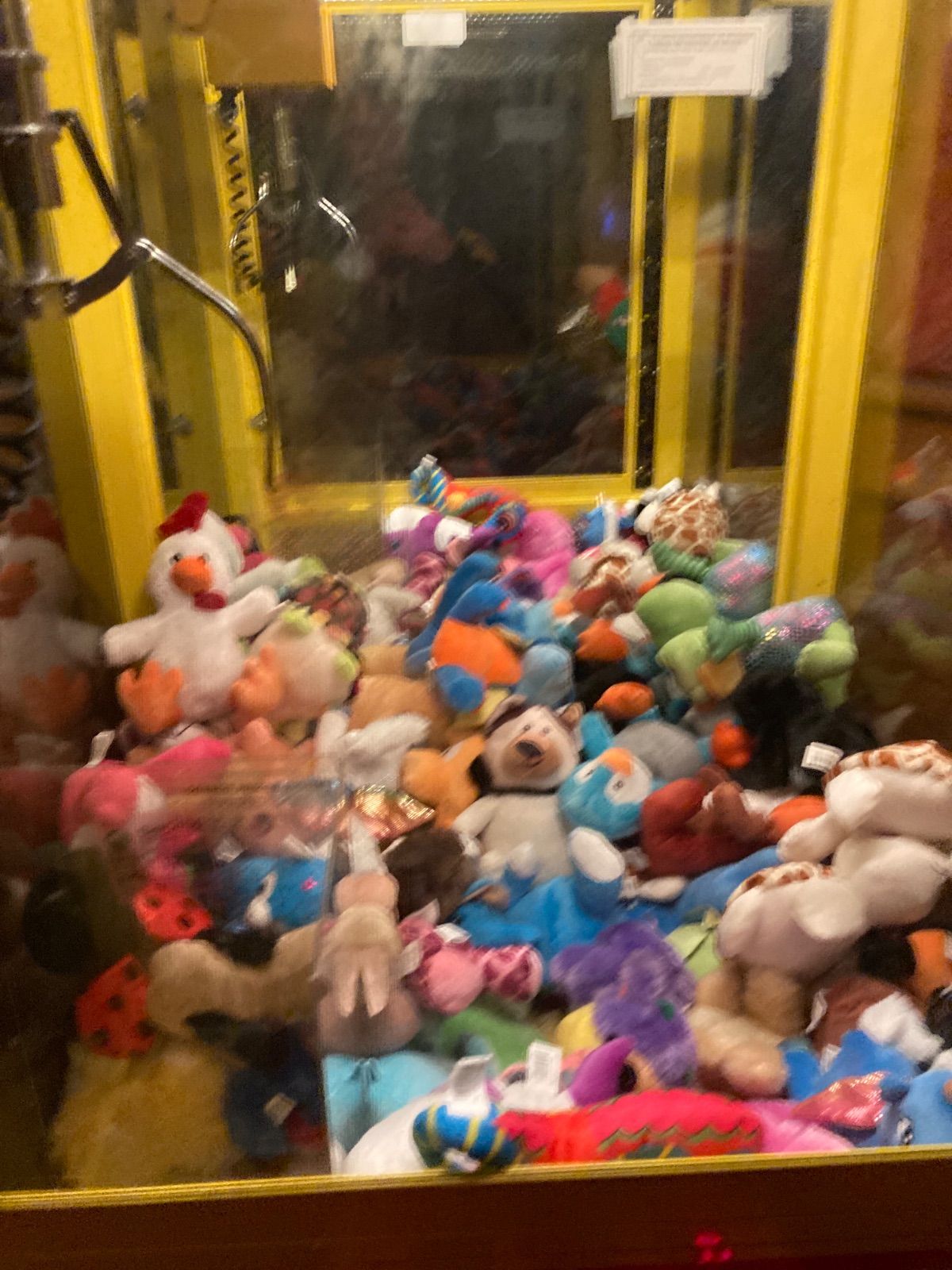 Claw machines at Sluggers World Class Sports Bar and Grill & Dueling Pianos in Chicago, Illinois